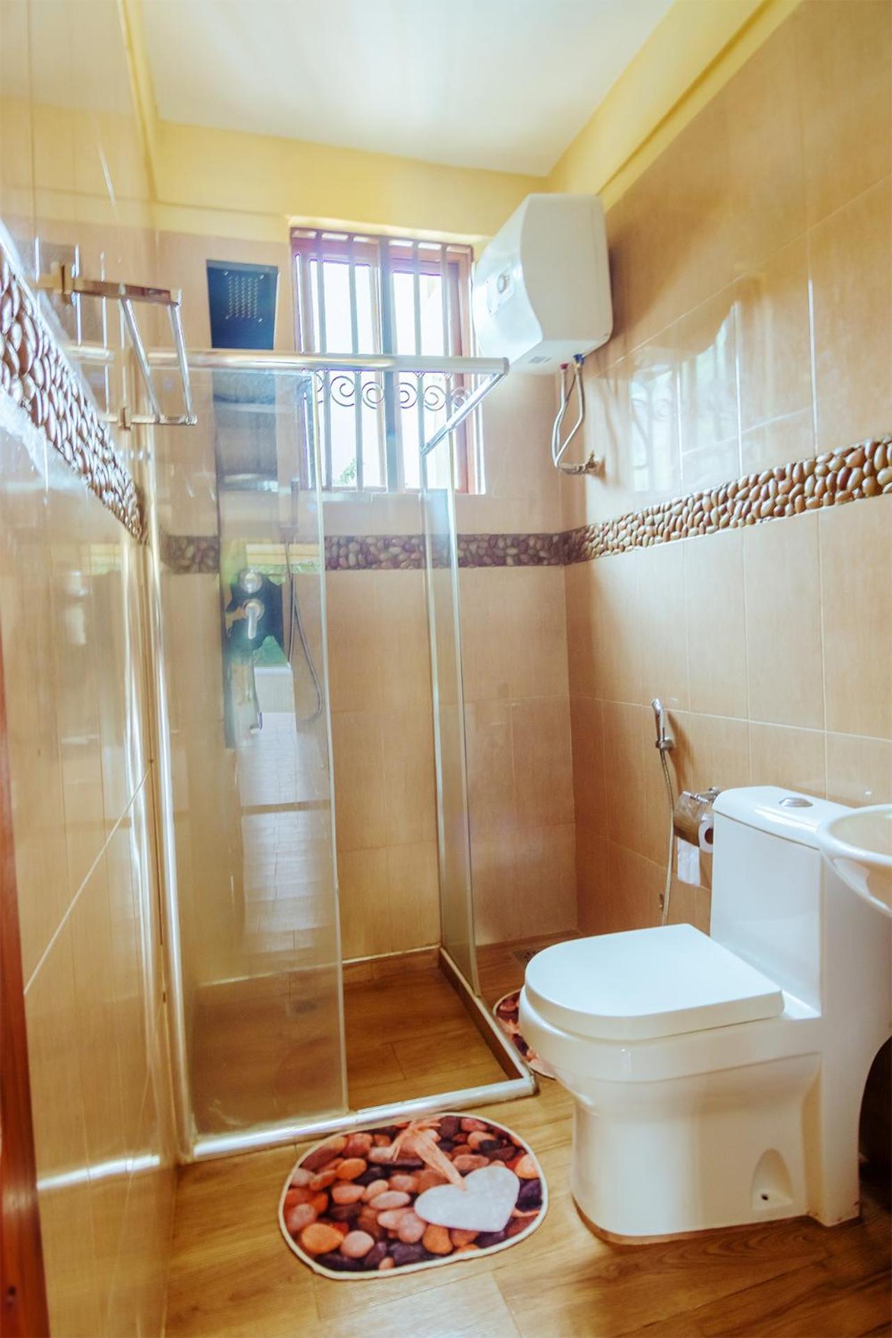 Rayan Apartments & Safaris أروشا الغرفة الصورة