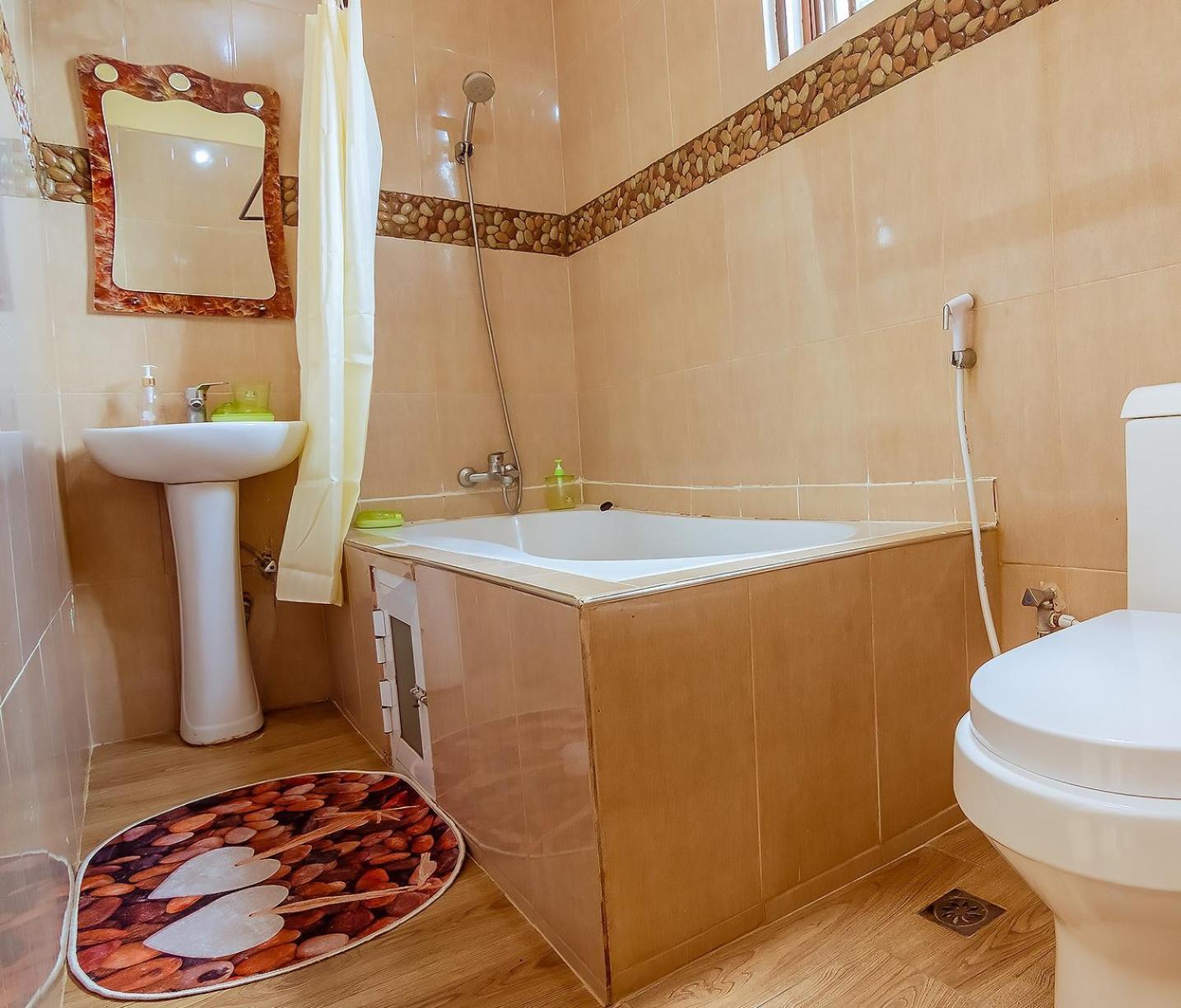 Rayan Apartments & Safaris أروشا الغرفة الصورة